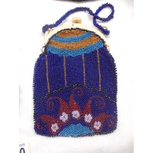 1070 - Five early purses including two beaded examples.