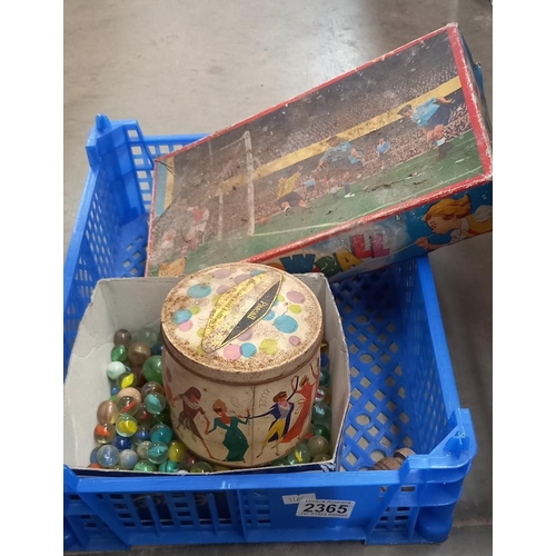 2365 - A bag of vintage marbles, tin of plastic soldiers & boxed blow football