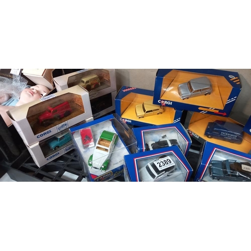 2389 - A quantity of boxed mainly Corgi mini diecast models including Citroen 2CV etc