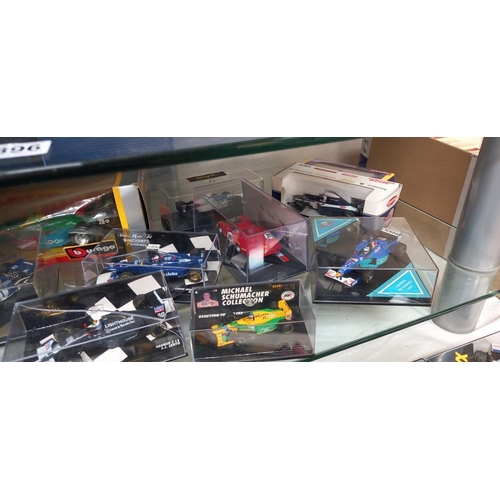 2397 - A good selection of mainly onyx diecast Formula 1 cars