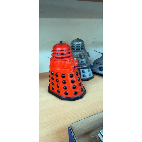 2412 - A Doctor Who battery operated 2 Tomy daleks &  1 to 9 untested