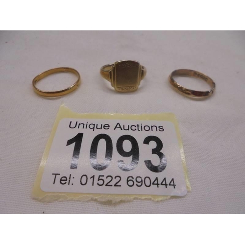 1093 - Two 9ct gold wedding rings and a 9ct gold signet ring, 6.14 grams.