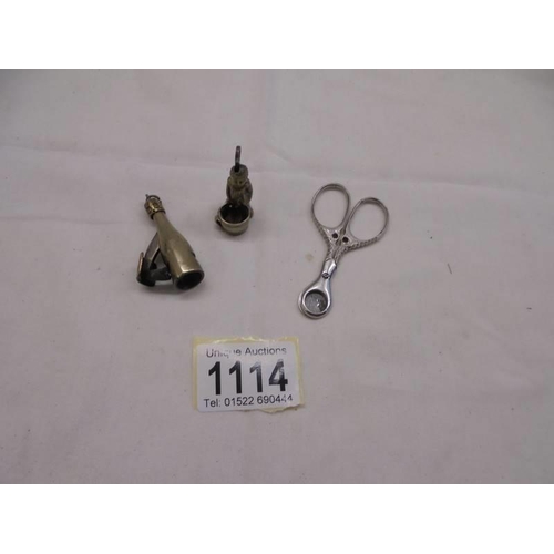 1114 - Two Victorian novelty cigar cutters and one other.