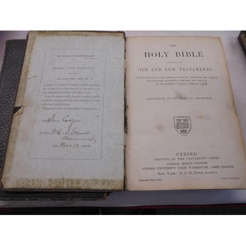 1118 - Two early 20th century Bibles bequeathed by the will of Philip Lord Wharton 1696, one in distressed ... 