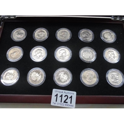 1121 - A cased set of fifteen Susan B Anthony dollars.