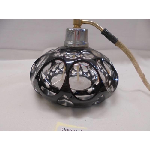 1128 - A good quality overlaid glass perfume bottle/atomiser.