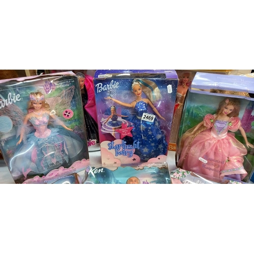 2469 - 8 Boxed Barbie dolls (1 of which is Ken)