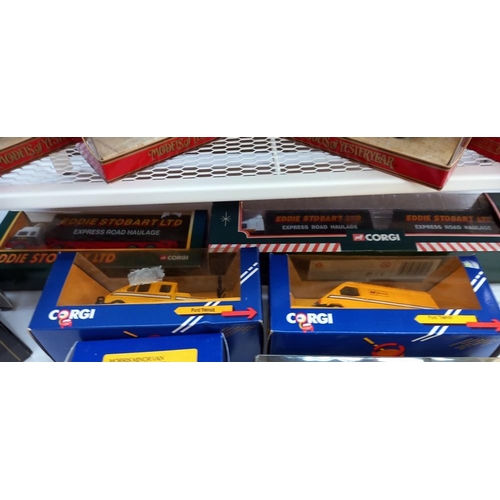 2500 - A quantity of boxed Corgi including Eddie Stobart Ford transits