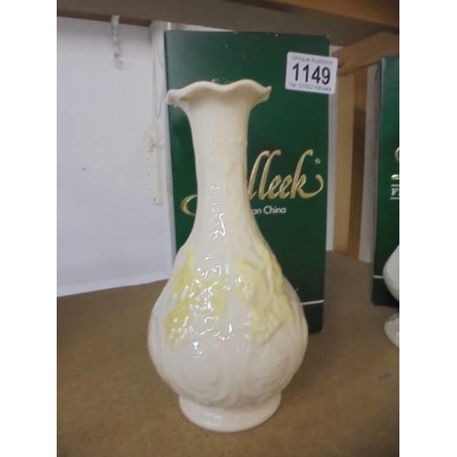 1149 - Two boxed Belleek vases.