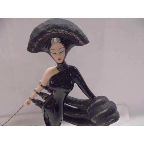 1162 - A boxed Franklin Mint Art Deco style Erte figurine - Symphony in Black.