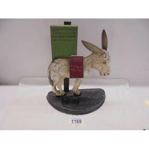 1169 - A rare novelty tin place cigarette dispenser of a donkey.