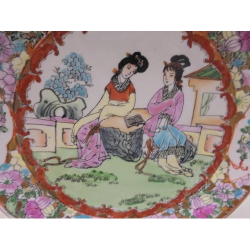 1173 - A hand painted Japanese Satsuma plate.