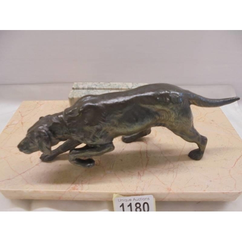 1180 - A bronze? hunting dog on a marble base as a photo frame.