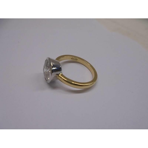 1208 - Certificated 18ct yellow gold and platinum solitaire ring bezel-set with a transitional cut natural ... 