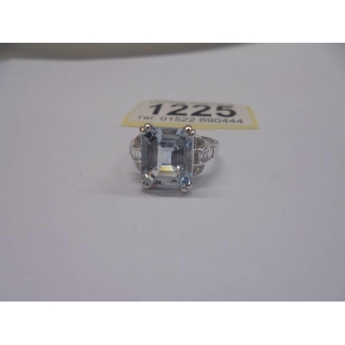 1225 - 18ct white gold aquamarine and diamond ring.  Emerald-cut aquamarine 3.41ct. RBC and baguette diamon... 