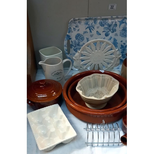 22 - A good lot of Kitchenalia including Stoneware jugs, Laura Ashley egg holder & toast racks etc