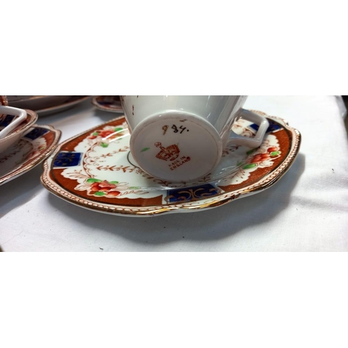 29 - A 1930s Bone China trio's cups & Saucers with cake plates