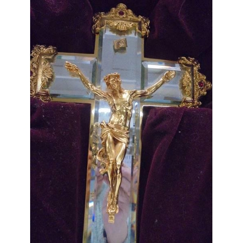 1232 - A boxed gilt mounted glass crucifix.