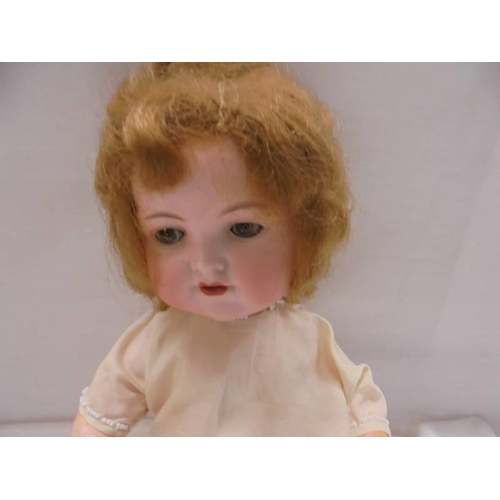 1235 - A 19th century Armand Marseille Germany 990 A-2-M porcelain doll.