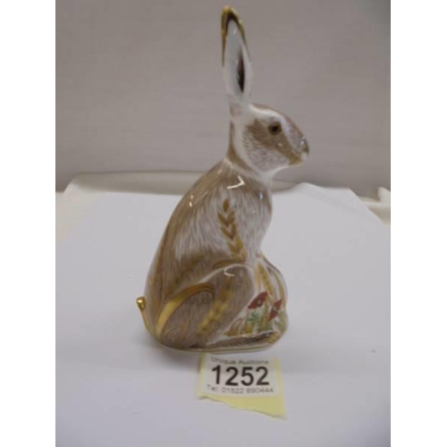 1252 - A Royal Crown Derby Midsummer Hare with gold stopper.