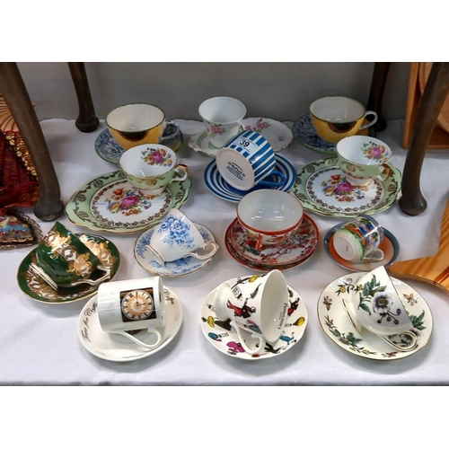 39 - A selection of cups & saucers including Aynsley, Wedgwood & House of Commons etc