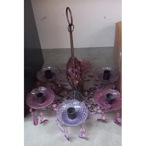 40 - An Amethyst glass 5 arm chandelier & A box of tea light holders