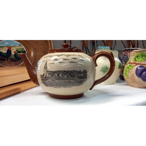 46 - A 1930's teapot with scenes of Ropsley. Christmas gift from A.F Rowell grocer & draper