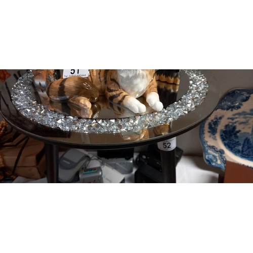 52 - A 3 legged mirror topped decorative table