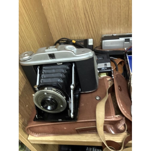 402 - Good selection of instant cameras, a poloroid camera, GB Kershaw 110, a Ricoh KR-10 plus others