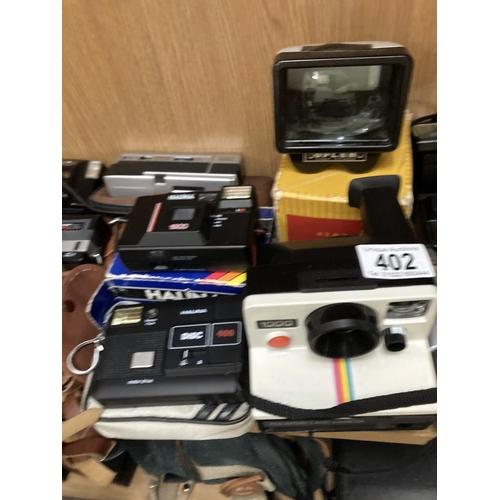 402 - Good selection of instant cameras, a poloroid camera, GB Kershaw 110, a Ricoh KR-10 plus others