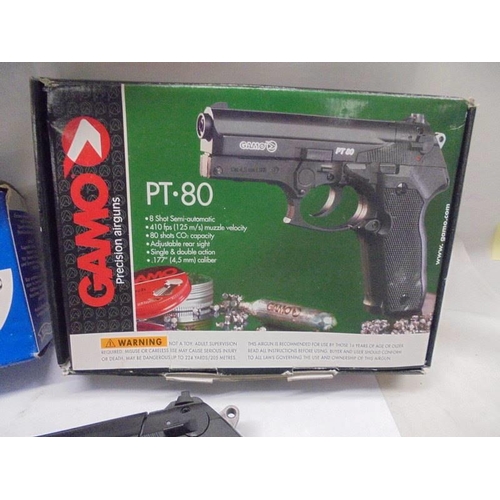 1238 - A boxed Gamo precision airgun with capsules.