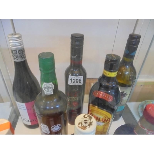 1296 - A bottle of cherry brandy, Drambuie, White port, Gin Liqueur, Kahlua and three other bottles, COLLEC... 