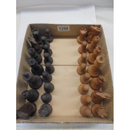 1298 - A vintage weighted wooden chess set (missing one white pawn).