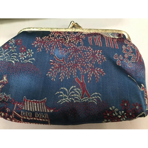 649 - A quantity of 20th century Chinese style purses / pouches