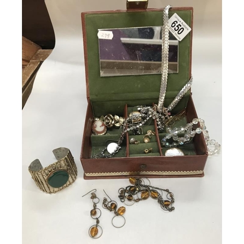 650 - A vintage jewellery box & contents