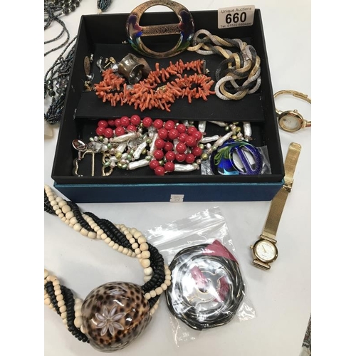 660 - A box of interesting costume jewellery and Sekonda watch