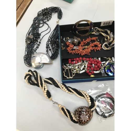 660 - A box of interesting costume jewellery and Sekonda watch