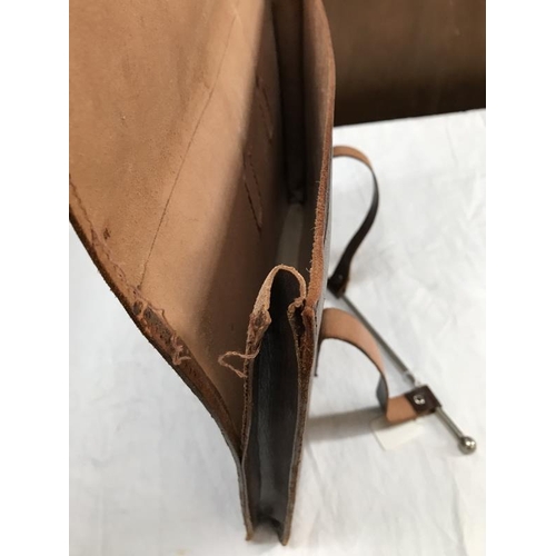 682 - Leather bag with unique metal bar to close