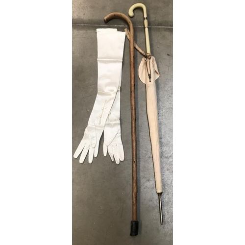 692 - Four evening gloves, walking stick and an umbrella A/F