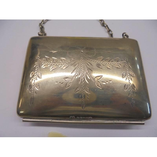 1243 - An Edwardian silver plate evening purse.