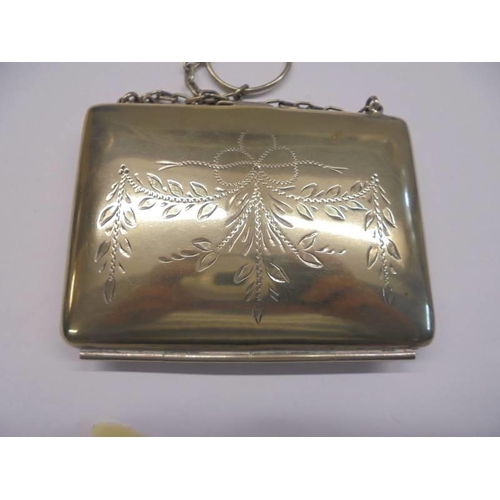 1243 - An Edwardian silver plate evening purse.