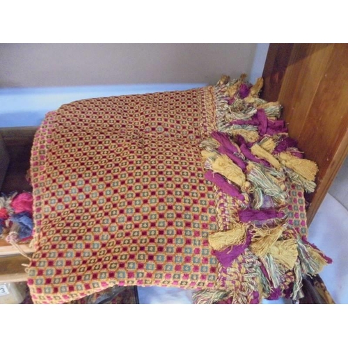 1313 - A vintage tassled throw and a quantity of curtain cords.