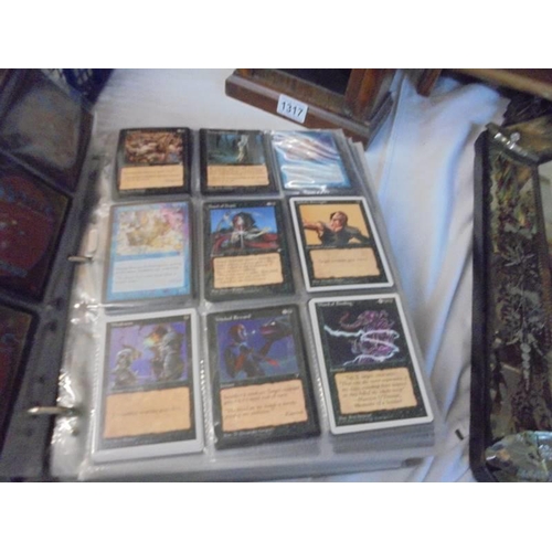 1316 - A large album of Magic collector's cards.