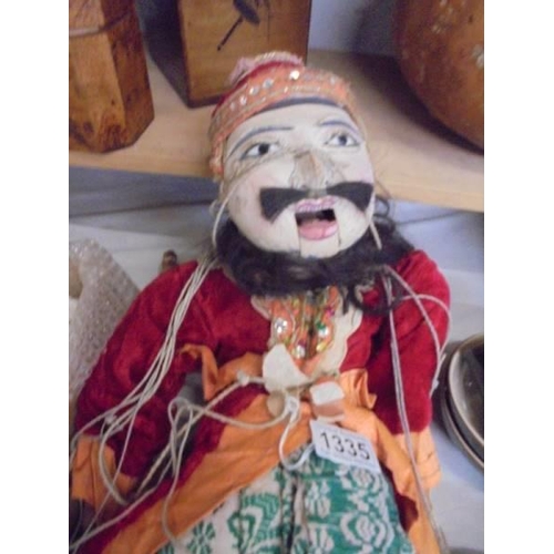 1335 - An old oriental style string puppet.