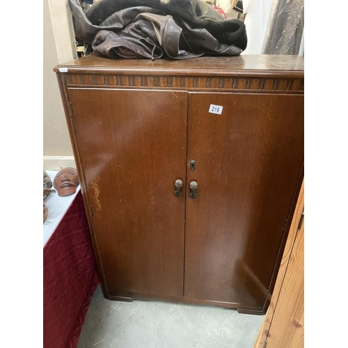 219 - A 2 door 1930's low wardrobe 55cm x 37cm x 47cm tall) COLLECT ONLY