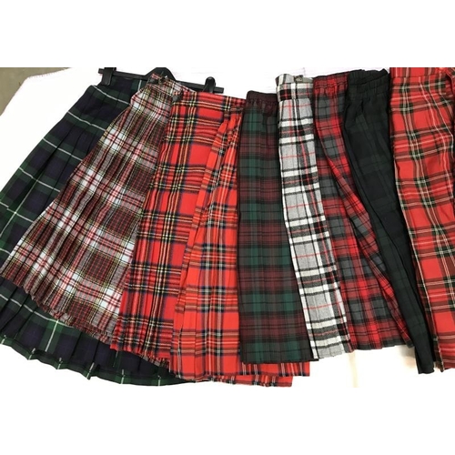 729 - 12 Tartan Skirts. Various sizes & colours