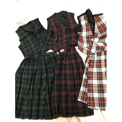 734 - Three sets of Tartan skirts with matching waistcoats size 14 / M