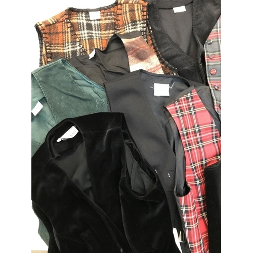 738 - A large quantity of ladies clothing including skirts, shirts and waistcoats