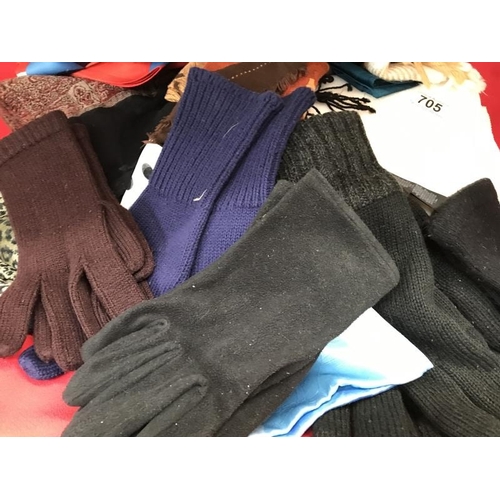 705 - A quantity of scarves, gloves etc