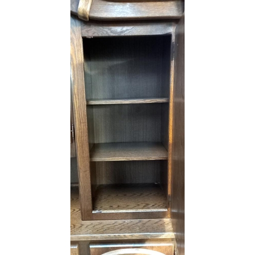 274 - A large heavy oak wall unit (180cm x 52cm x 209cm) COLLECT ONLY